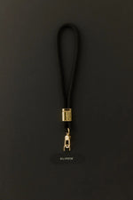 Load image into Gallery viewer, Klipsta LOOP Phone Wrist Strap - Black & Gold