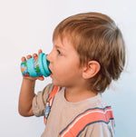 Load image into Gallery viewer, Chino Club Baby Chino Cup 4oz - Dinosaurs & Monster Trucks