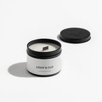 Load image into Gallery viewer, Light &amp; Glo Travel Candle - Tigerlilly &amp; Patchouli
