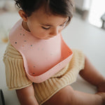 Load image into Gallery viewer, Mushie Silicone Bib - Pink Confetti
